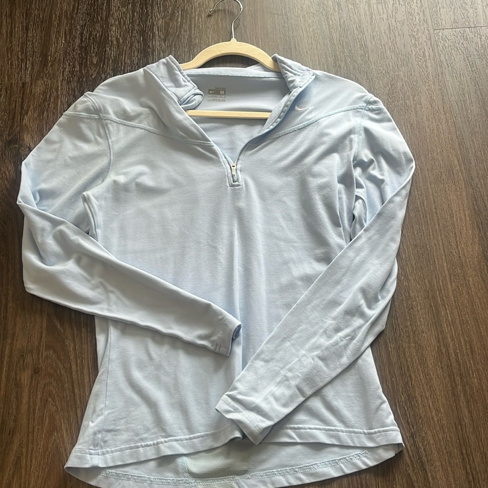 Medium-long sleeve- half zip dry fit Nike running shirt. Good condition
